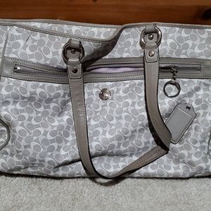 Grey and white Coach purse